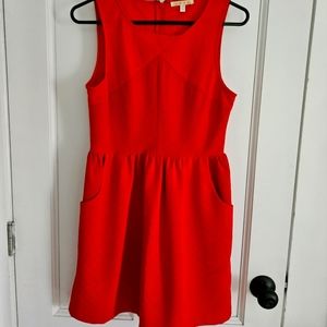 Under skies red dress size S. Knee length or just above.